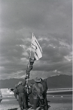 The Ink Flag erected at Umm Al-Rashrash (Eilat) by     Israeli soldiers, March 10<sup>th</sup>, 1949 (Micha Perry, Government Press Office     of Israel. CC BY-NC-SA 2.0).